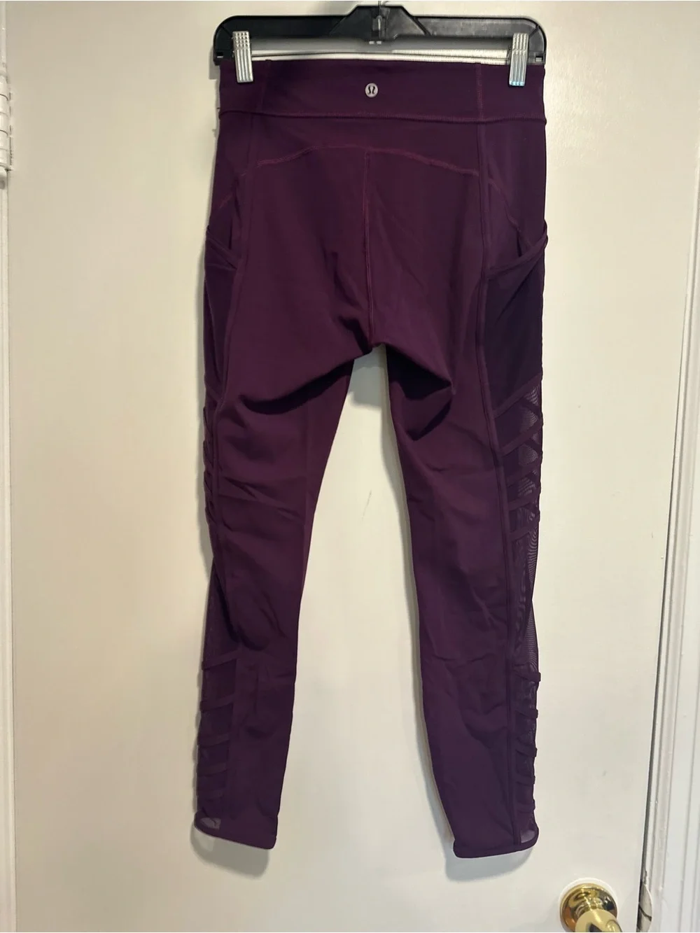 Lululemon Wild and Free purple leggings mesh sides/ pockets strappy detailing.